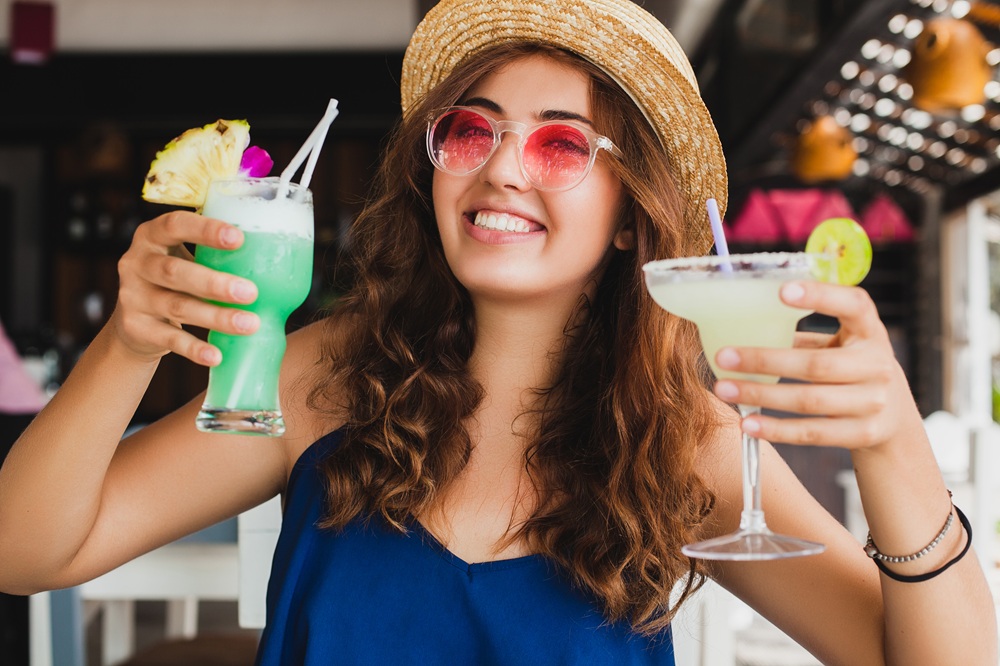 Young,Stylish,Beautiful,Woman,,Pink,Sunglasses,,Straw,Hat,Holding,Blue