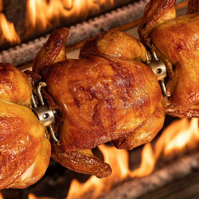 chicken on a rotisserie flame