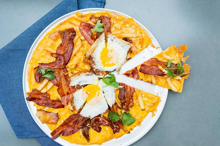 Cheese Crisp with bacon, eggs and french fries