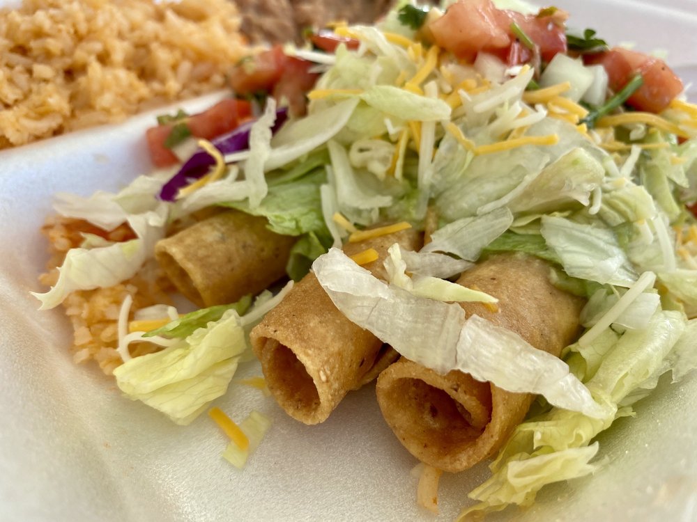 three rolled taco plate
