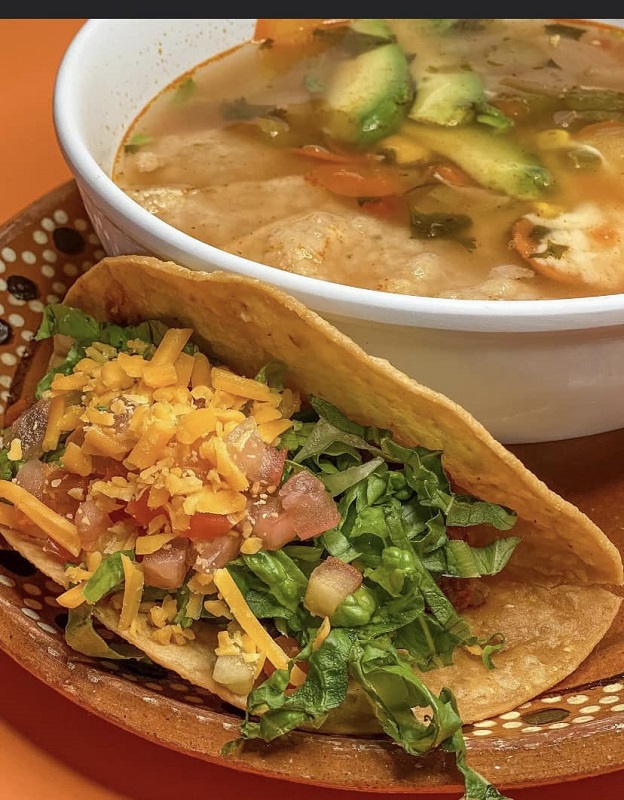 Chicken tortilla soup and side taco