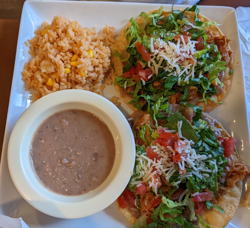 Tostada Plate with Mexican rice and refried beans