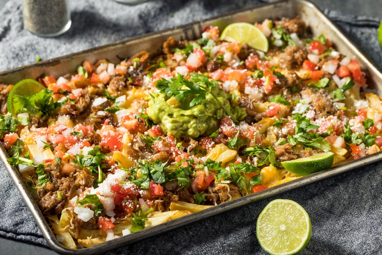 Healthy,Homemade,Carnitas,French,Fry,Nachos,With,Pico,And,Guacamole