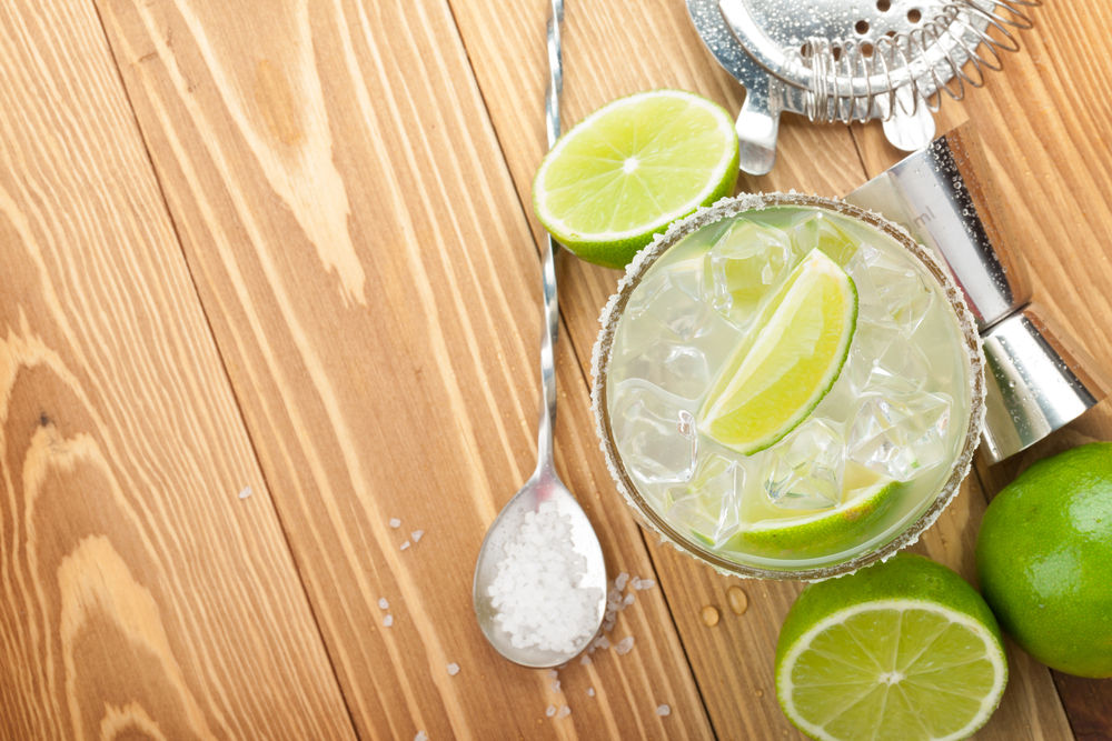 Classic,Margarita,Cocktail,With,Salty,Rim,On,Wooden,Table,With