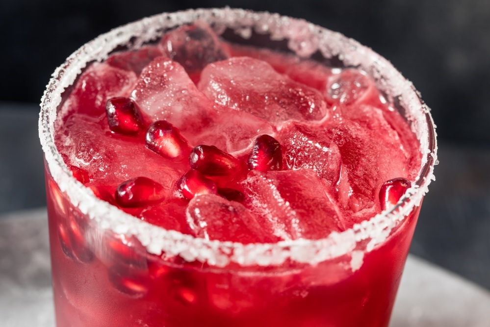 Boozy,Festive,Pomegranate,Margarita,Cocktail,With,Lime,And,Tequila