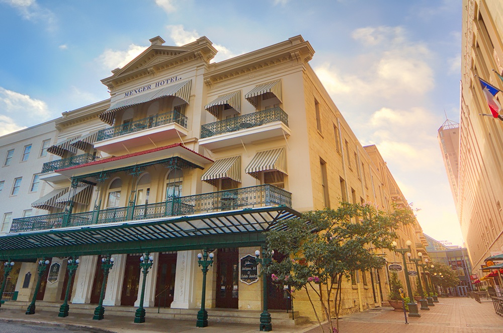 The historic Menger Hotel in San Antonio, with its grand architecture against a clear Texas sky.