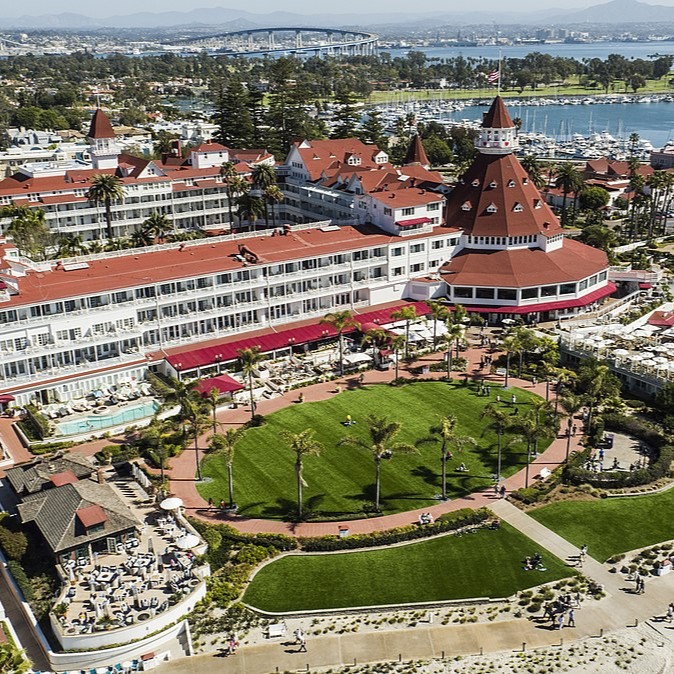 The sprawling beachfront of Hotel del Coronado with its iconic red-roofed architecture.