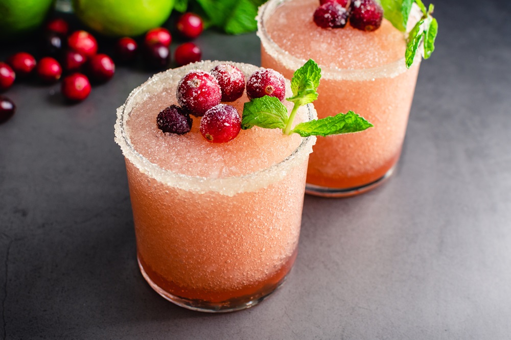 Cranberry,Margaritas,Garnished,With,Sugared,Cranberries,And,Mint:,Frozen,Margarita