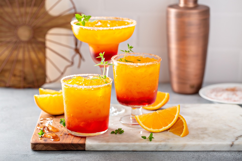 Tequila,Sunrise,Margarita,Cocktail,In,Different,Glasses,With,Ice,,Refreshing