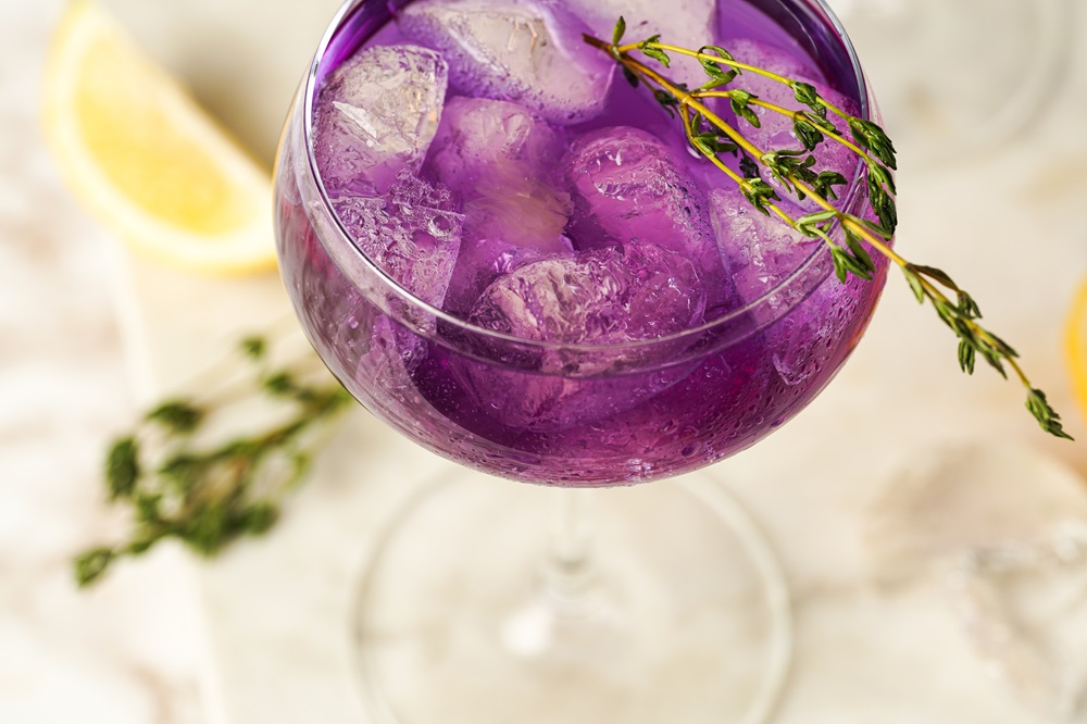 A,Purple,Drink,In,A,Vintage,Glass,For,Sparkling,Wine