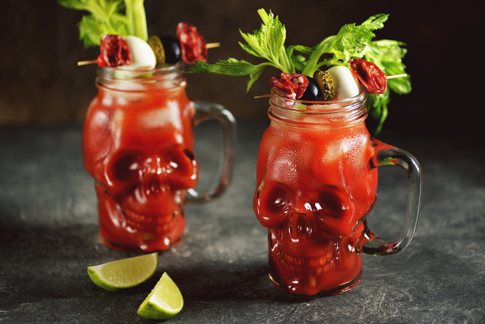 Bloody,Mary,Cocktail,In,Glass,Skull,With,Celery,Sticks,,Pink