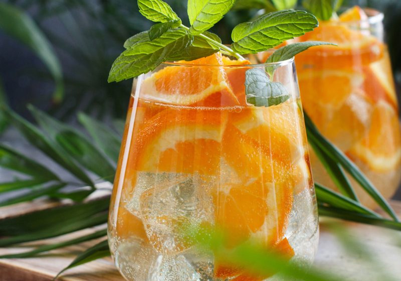 refreshing mocktail with soda and orange juice