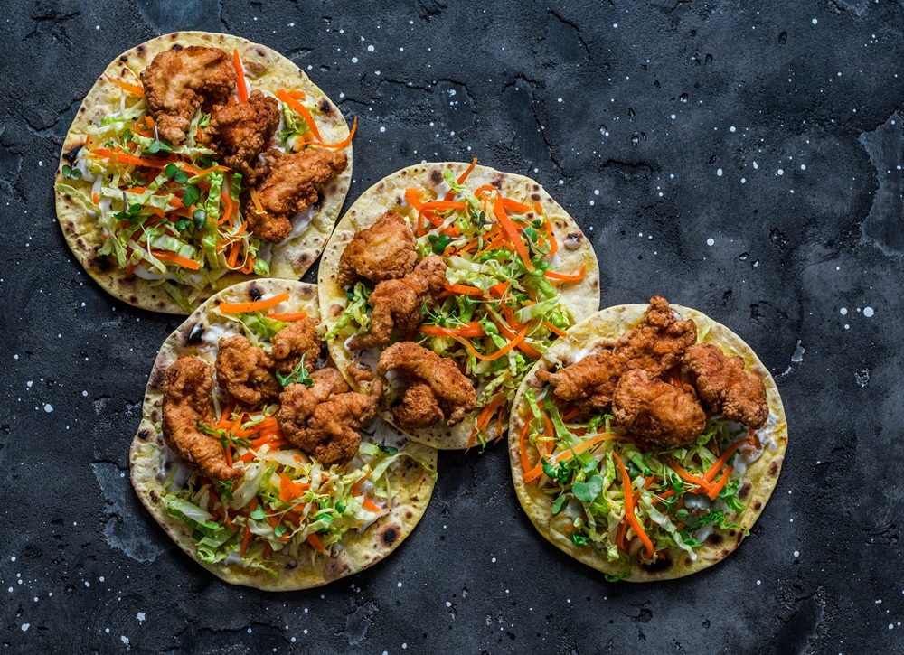 Korean,Tempura,Fried,Shrimp,And,Coleslaw,Tacos,On,Dark,Background,